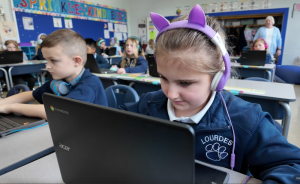 Students at Our Lady of Lourdes in Cincinnati work through personalized math lessons on ClassGaga during class.