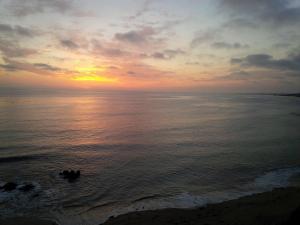 Sunset over the ocean in Orange County California symbolizing peace and recovery