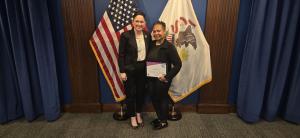 Jennifer Maddox receives recognition at an award ceremony hosted by Illinois State Comptroller Susana A. Mendoza in Chicago