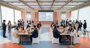 Industry professionals gather for a corporate seminar and networking session at The Summer Social