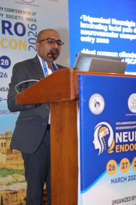 Dr Mohana Rao Patibandla presenting on trigeminal neuralgia endoscopic techniques at Neuroendocon 2026 conference in Jaipur