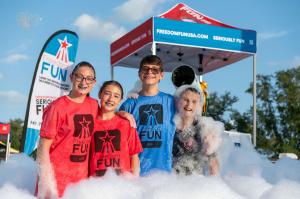 Teenagers having a foam party with Freedom Fun USA mobile entertainment in Winston-Salem North Carolina