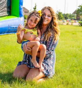 Mom and daughter enjoying a Freedom Fun USA mobile entertainment event in Winston-Salem North Carolina