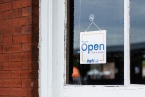 visit marietta open sign