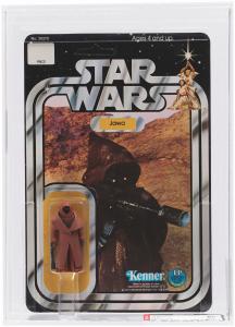 Blister card containing a 2¼-inch-tall Star Wars Jawa action figure of the initial “Vinyl Cape” variety, made by Kenner in 1978, graded AFA 95 Mint, the highest grade Hake’s has ever offered for the toy. Sold for $55,152
