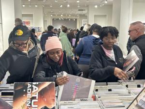 It's a photo of customers digging for records.