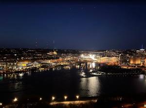Pittsburgh skyline at night viewed from Mount Washington overlooking downtown and the three rivers