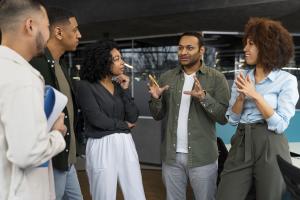 Group of entrepreneurs and investors collaborating on funding and scaling strategies