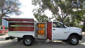 Real Fleet Solutions Magnum pest control upfit spray truck with open compartment for tanks and tools