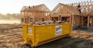 Clarks Dumpster and Hauling Services roll off container at new home construction job site