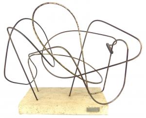 Iron freeform sculpture on a travertine stone base by the Argentine sculptor Enio Iommi (1926-2013), titled Continuidad. 26 inches long, marked ‘Iommi’, dated 1949. Estimate: $6,000-$8,000