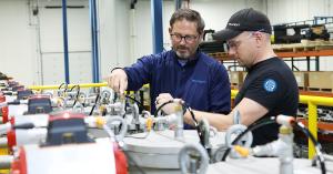Trucent technicians performing inspection and maintenance on industrial Boll filtration equipment.