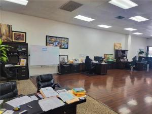 A wide-angle interior photograph of Direct Capital Lending's headquarters in Porterville, California.