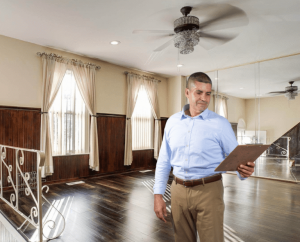 Glen Guadalupe inspecting a house