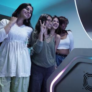 Friends capture a moment at the Pikcha AI Photo Booth. India's made-in-India AI photo booth, built by bamigos.com