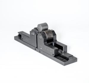it is an adjustable roll cradle with a small part in between the two adjustable lifts for roll marking