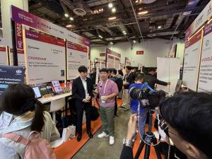 A scene from the booth of Crosshub during an interview