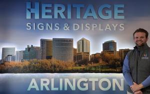 Caleb Gass stands in Heritage Signs & Displays’ Arlington office, where he has led the market since July 2025 to support clients across the Washington, DC metro area.