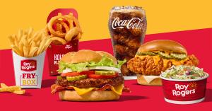 Roy Rogers meal featuring a cheeseburger, fried chicken sandwich, fries, onion rings, coleslaw and a soft drink.