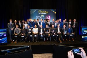 A group photo of award winners at an awards banquet for the combined SME and TCT awards in additive manufacturing.
