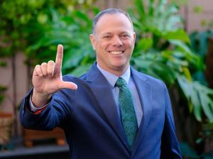 Metairie Attorney Loyd Bourgeois giving the L