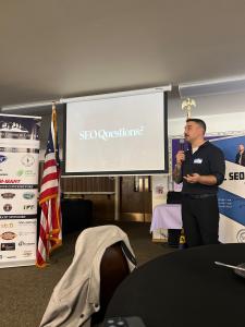 owner of ML SEO speaking at a chamber event