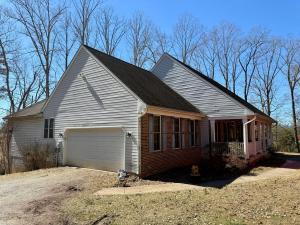 The custom built 4 BR/3 BA Greystone Home features a partially finished basement with a bedroom and bathroom, attached garage, large rear deck and screened porch and is conveniently located only .7 miles off of Rt. 29, 3 miles from downtown Madison, VA.