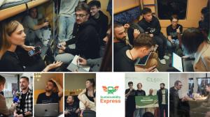 Participants working in teams inside a train during Sustainability Express hackathon, using laptops and discussing ideas for sustainability solutions