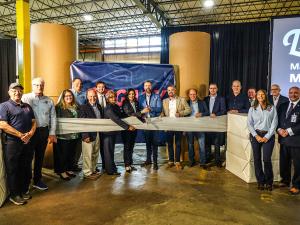 Ceremonial paper cutting with Governor Gretchen Whitmer to celebrate the launch of Legacy Port Huron Paper