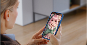 A woman having a real time video call on her phone with an anime character