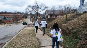 Volunteers set out on their neighborhood survey to locate and address the needs of the community.
