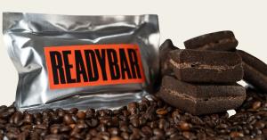 READYBAR Espresso Mocha Meal Bar on top of espresso beans