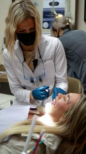 Dr. Kelly Harness at PFFCD with patient