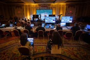 corporate event photography conference general session audience stage presentation