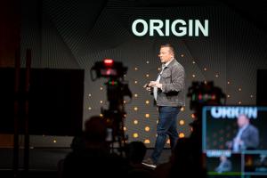 corporate event speaker on stage presentation professional lighting photography