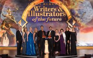 Winners and presenters (l to r): John Goodwin, Emily Goodwin, Echo Chernik, Jannicke Mikkelsen, Bafu, Michael Kuester, Andrea Fleck-Nisbet, Jody Lynn Nye, Gunhild Jacobs, Joni Labaqui on the stage at the Taglyan Complex in Hollywood, CA