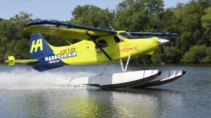 Electric seaplane taxiing on the water at Oshkosh