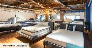 SleePare Los Angeles mattress showroom interior with multiple beds on display.