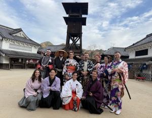 Tourists wearing samurai costumes at Edo Wonderland Nikko Japan immersive experience
