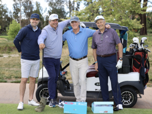 Perricone foursome pictured on golf course by cart: Bob Rovzar, Andy Rovzar, Michael Rovzar, & Jim Kalmbach
