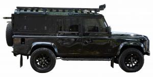 1986 Land Rover Defender Custom vehicle featuring a black exterior with black interior and a replacement Corvette engine with automatic transmission. Estimate: $60,000-$90,000