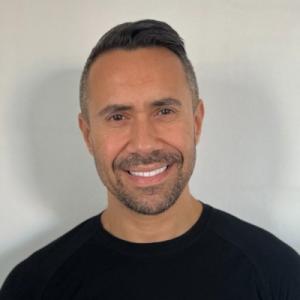 Smiling photo of our friendly game changer founder