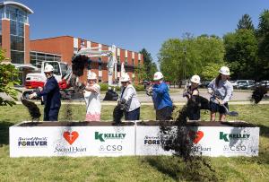 Sacred Heart Academy leaders celebrate the groundbreaking of the school's expansion and modernization project.