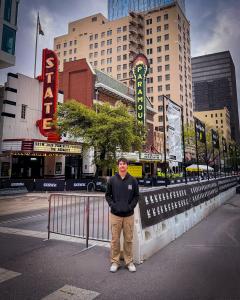 Devin Esser at SXSW Film and TV Festival in front of the historic Paramount and State Theatres.