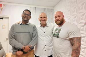 Dr. Kevin Greene standing with the inventor of the Trigen Kaizen EBOO system and a local wellness advocate at Confidia Health Institute in Bristol, Connecticut, during EBOO therapy implementation.