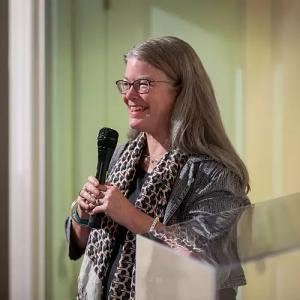 Dr. Hamilton presents during Eras' opening event.