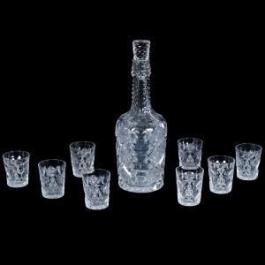 American Brilliant Cut Glass whiskey set signed Hawkes in the Queens pattern, with original signed Hawkes stopper, hobstar base, and eight 2¾-inch-tall tumblers. Estimate: $1,250-$1,750