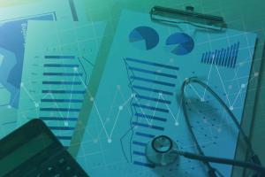 photo of a clip board with quality management health care reports and a stethscope laying on top