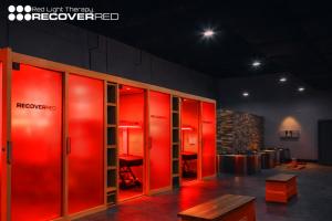 Pittsburgh athletic training facility featuring infrared saunas equipped with integrated red light therapy panels for recovery and performance.