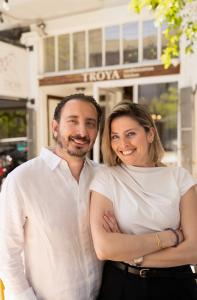 Berk and Betul Kinalilar standing outside Troya on Fillmore Street, San Francisco